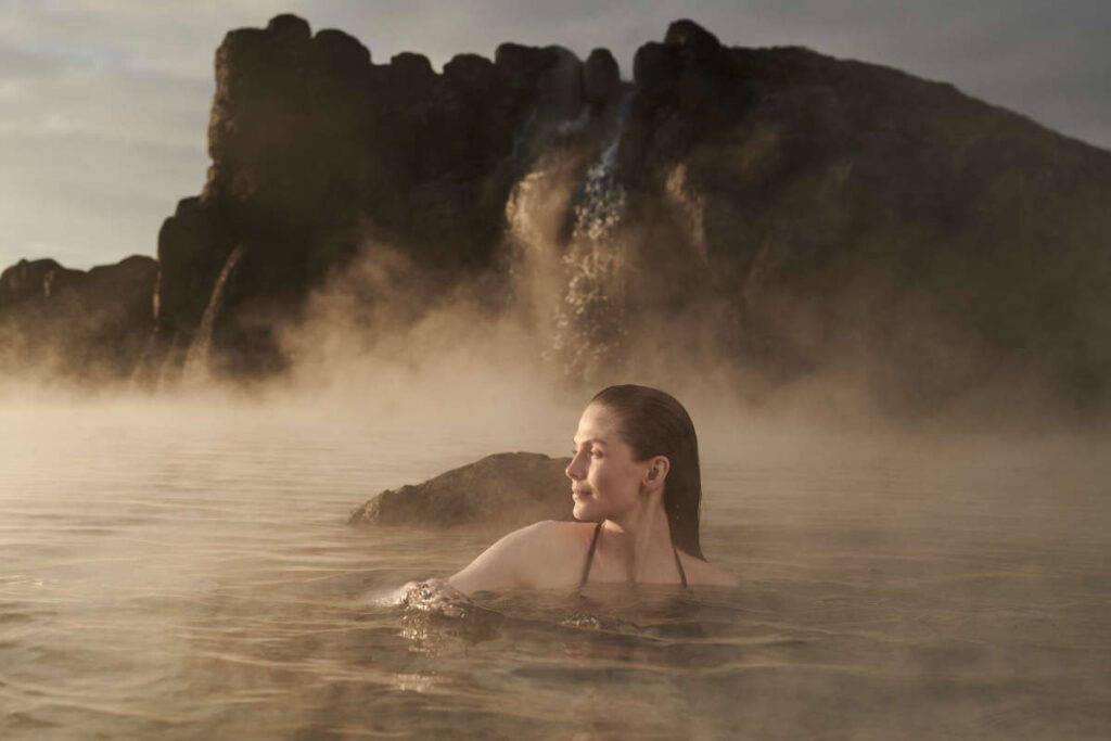 a woman in a hot spring